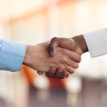 handshake between 2 people